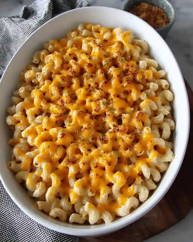 High Protein Mac and Cheese That’s Creamy, Easy, and Guilt-Free 5 High protein mac and cheese served with broccoli and lemon water