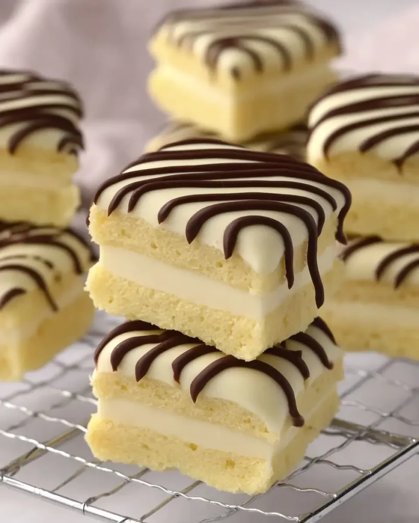 Inside view of homemade Zebra Cake with cream